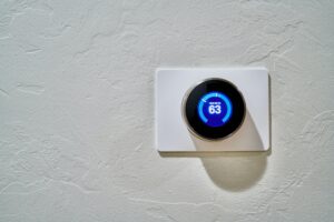 nest thermostat on wall